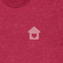 Load image into Gallery viewer, Red front of shirt with a pink house with heart on chest 
